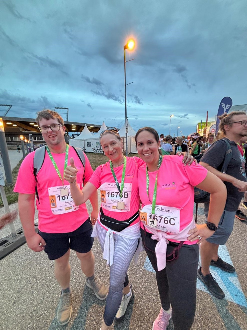 Drei Personen beim Vision Run
